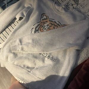 “Stay fearless” crew neck.